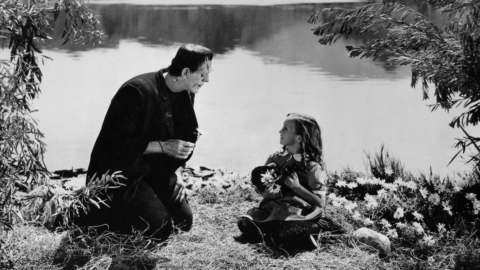 Boris Karloff's Monster meets the little girl picking flowers on the riverbank in Frankenstein (1931)