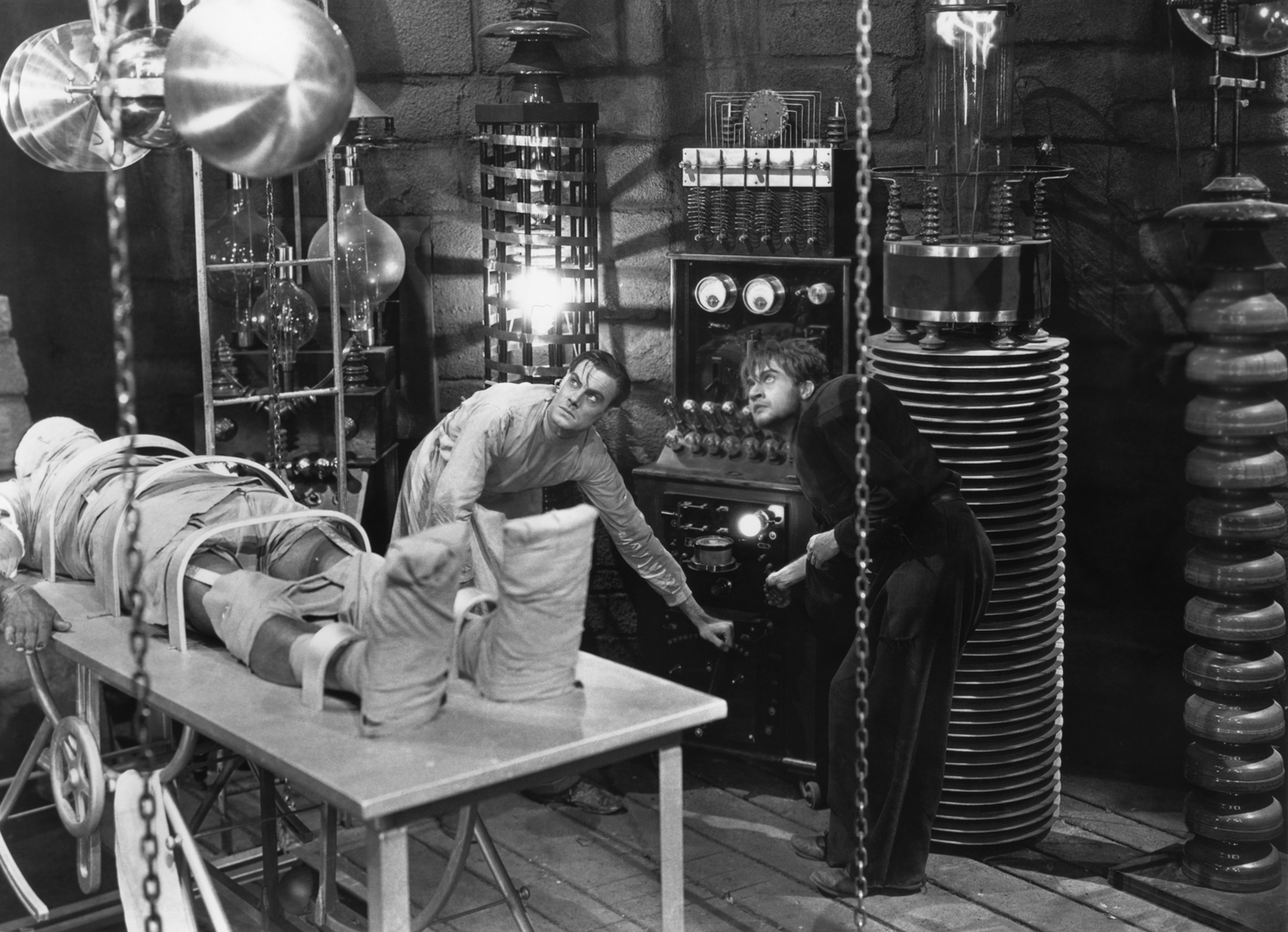 Colin Clive as Frankenstein and Dwight Frye as Friz, the original hunchback lab assistant, in Frankenstein (1931)