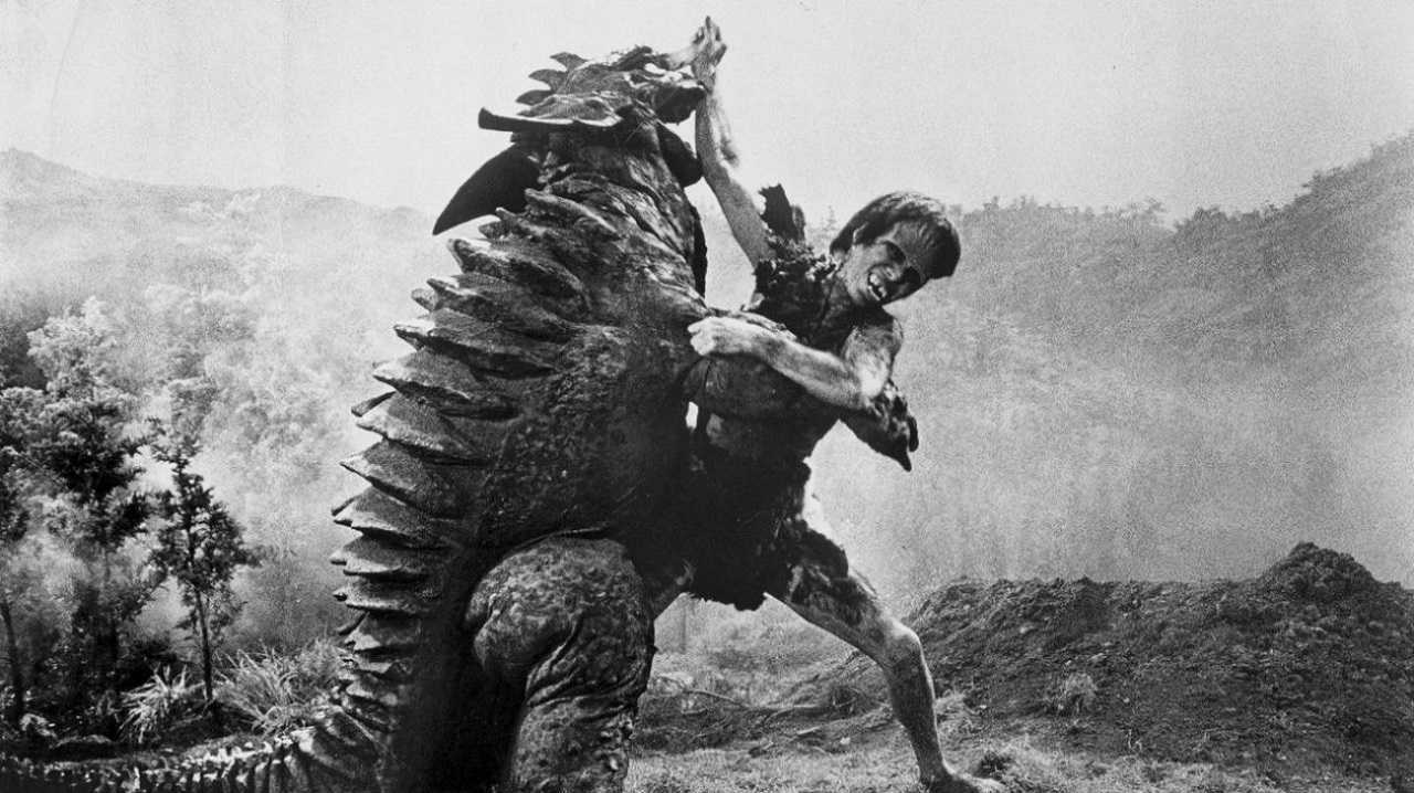 The giant-size Frankenstein boy (Kuji Furuhata) wrestles with Baragon in Frankenstein Conquers the World (1966)