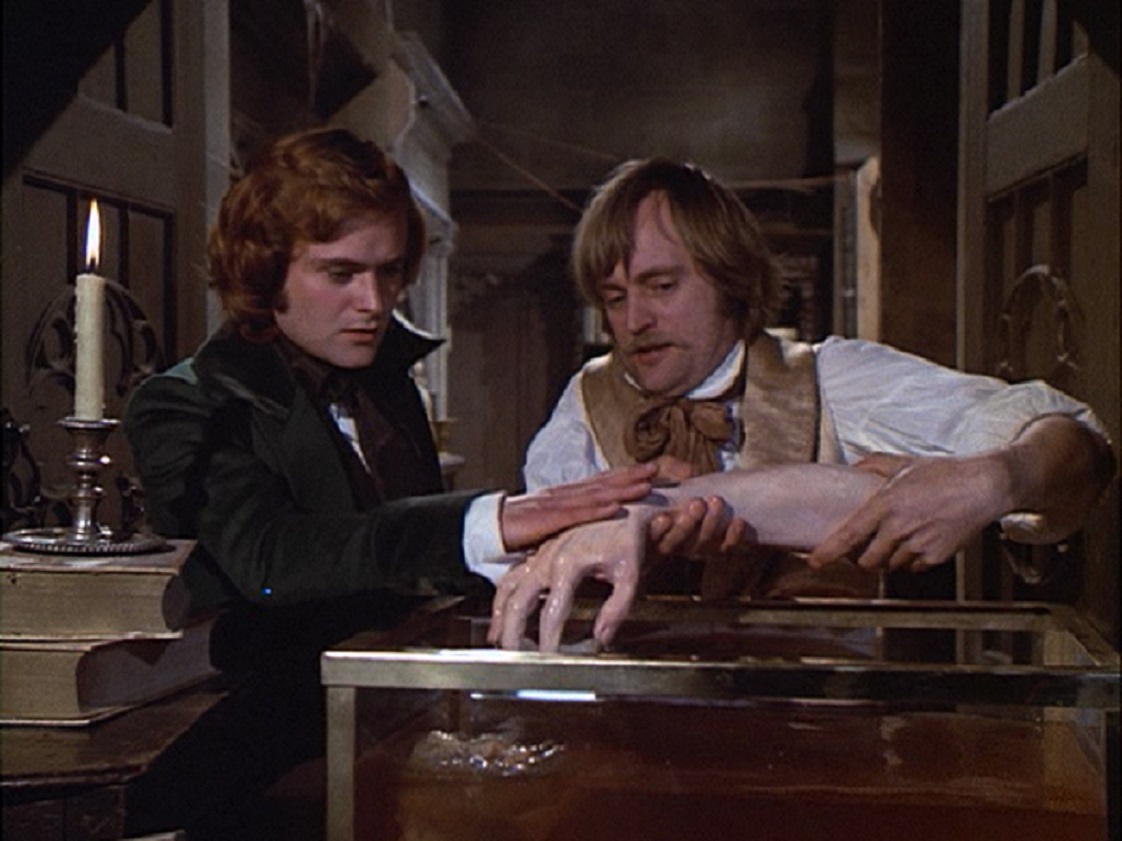 Victor Frankenstein (Leonard Whiting) and Henry Clerval (David McCallum) in the laboratory in Frankenstein: The True Story (1974)