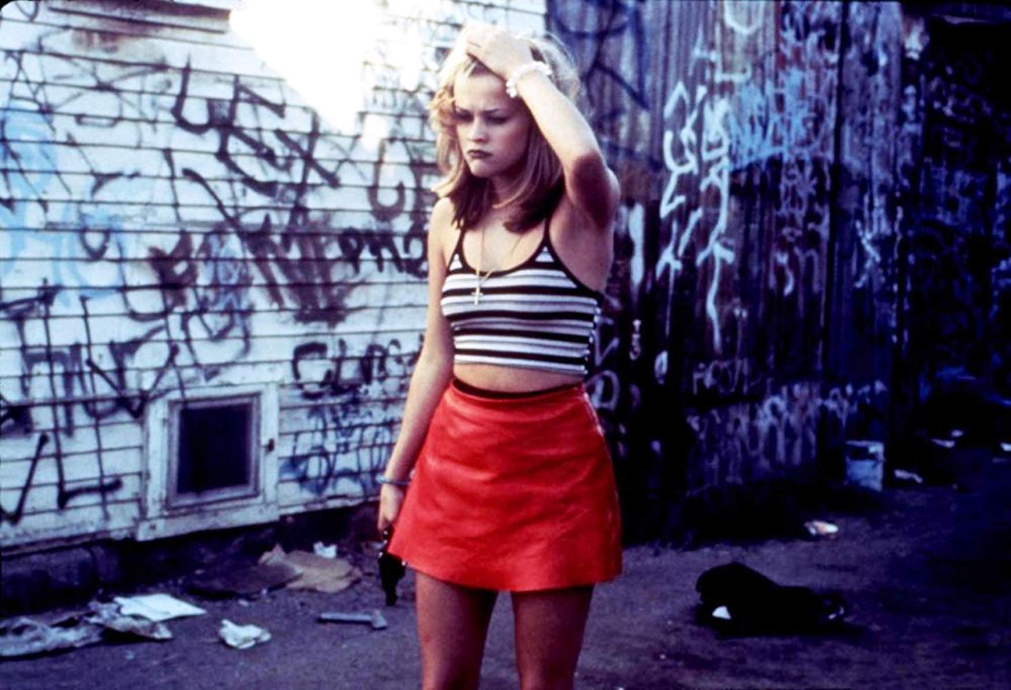 Reese Witherspoon as Vanessa Lutz, a no-longer innocent modern version of Little Red Riding Hood in Freeway (1996)