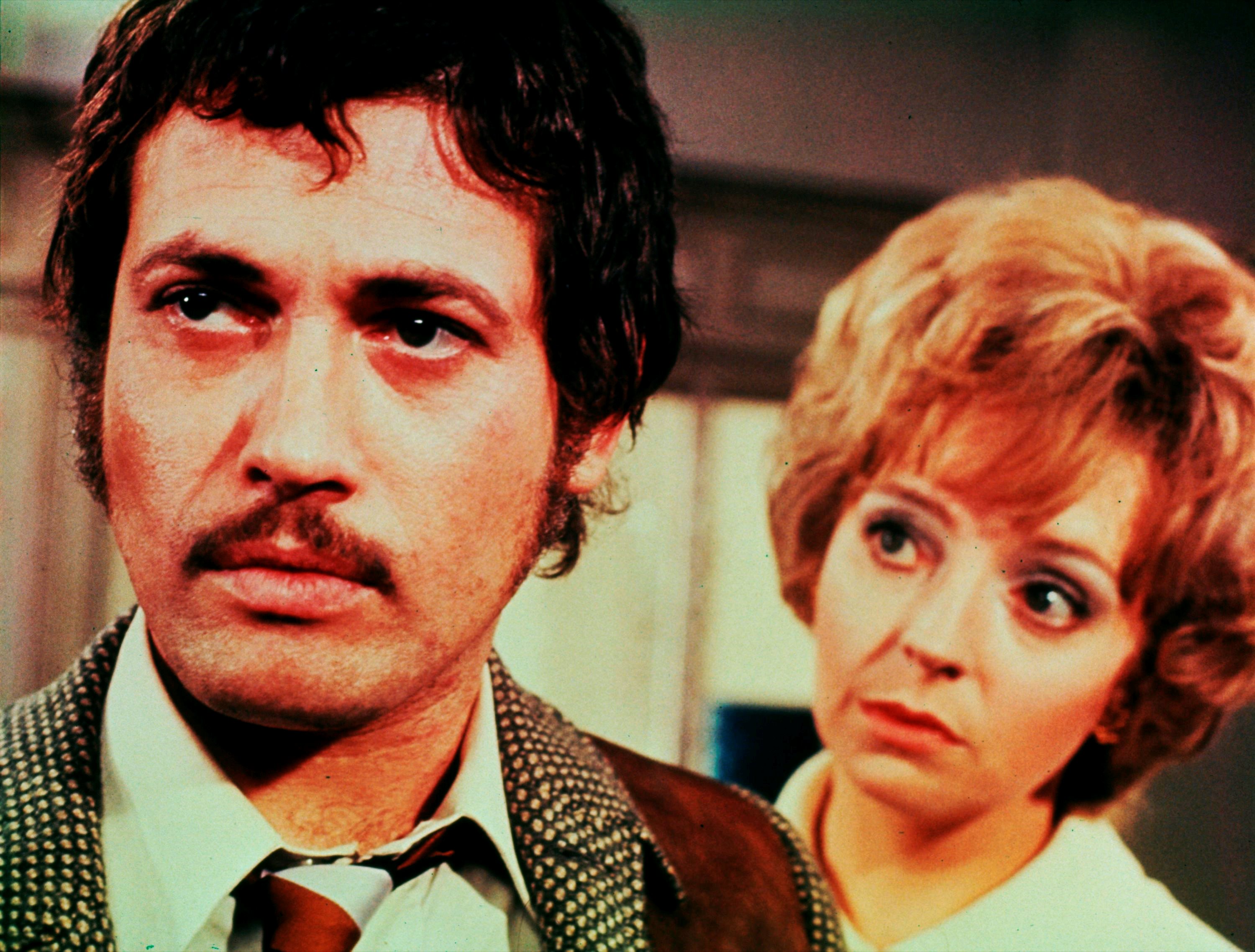 Jon Finch as the man wrongly blamed for a series of killings, along with girlfriend Anna Massey in Frenzy (1972)