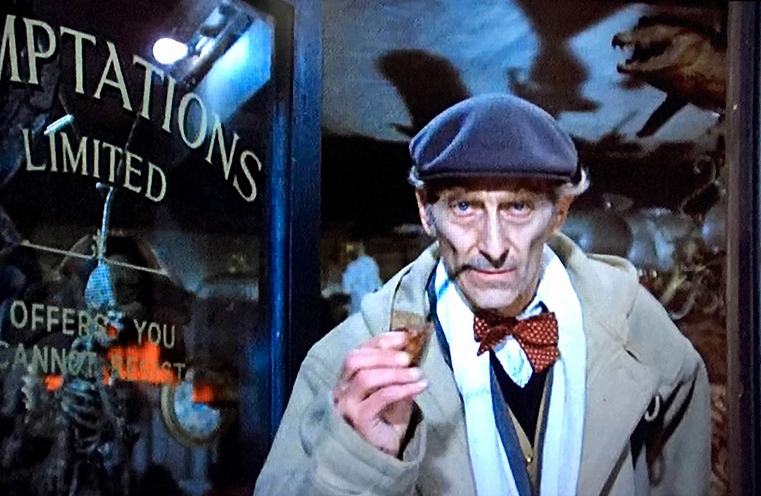 Peter Cushing as the antique store proprietor promises a little ‘something extra’ with everything he sells in From Beyond the Grave (1974)