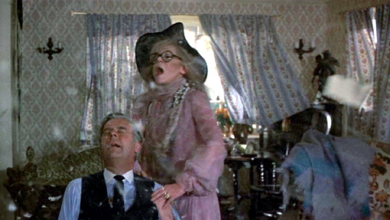 Ian Carmichael and daffy exorcist Margaret Leghton in From Beyond the Grave (1974)