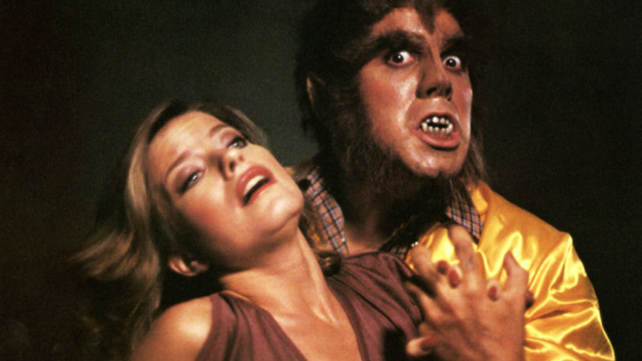 A werewolf Adam Arkin with Joanne Nail in Full Moon High (1982)