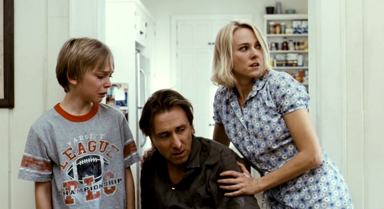 Husband and wife Tim Roth and Naomi Watts and their son Devon Gearhart under assault by home invasion in Funny Games U.S. (2007)