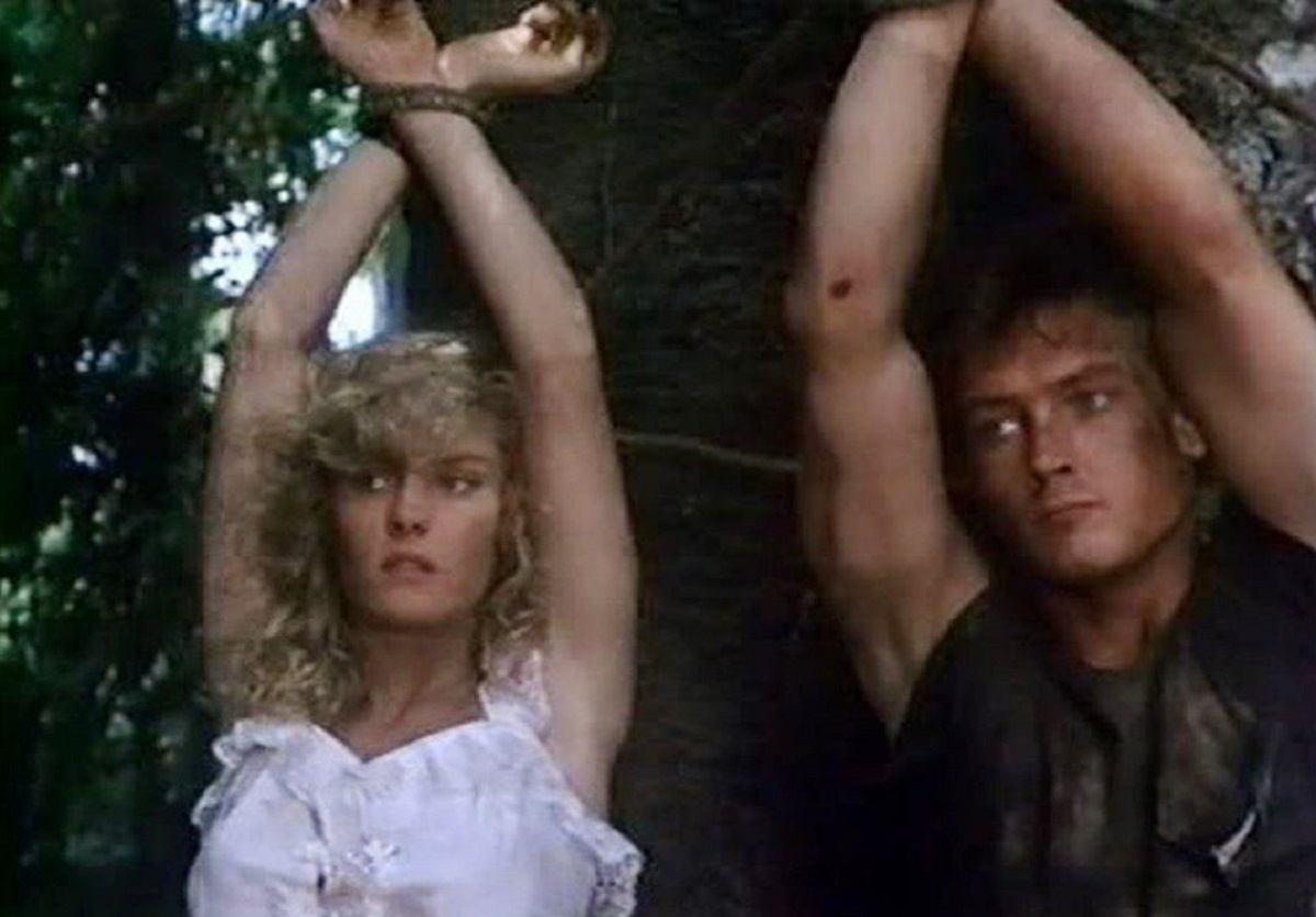 Linda Carol and Robert Patrick in Future Hunters (1986)