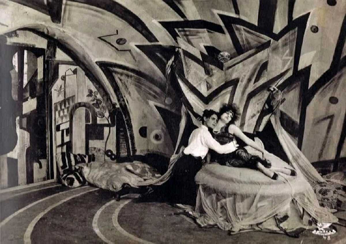 Florian (Hans Heinrich von Twardowski) and Genuine (Fern Andra) amid Robert Wiene's German Expressionist sets in Genuine (1920)
