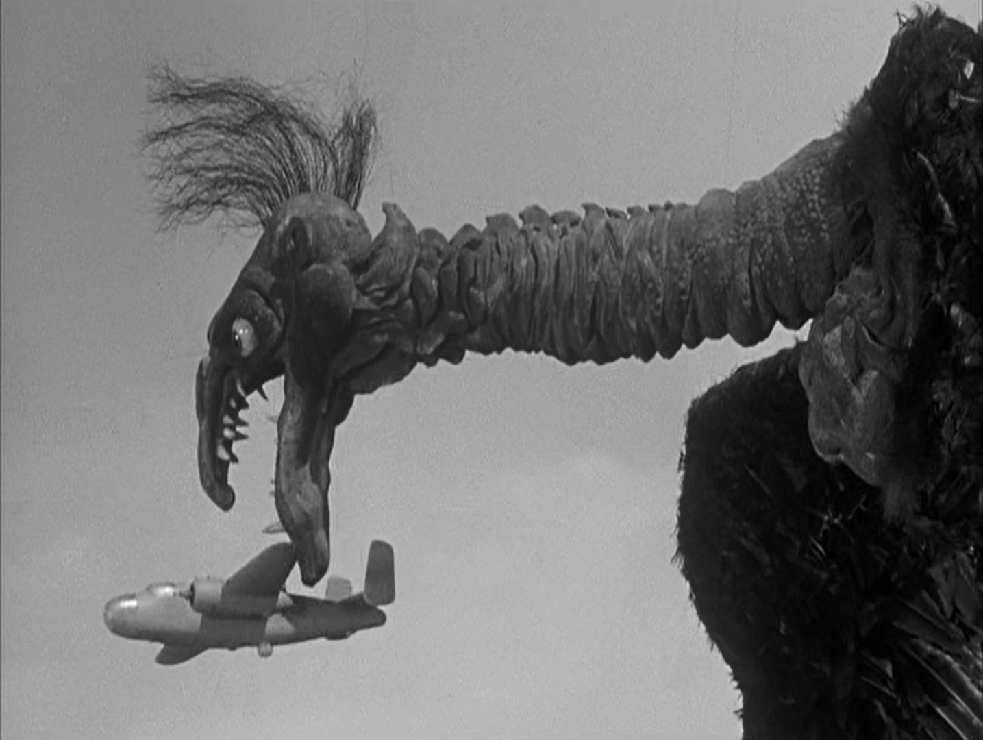 The giant alien bird attacks a plane in The Giant Claw (1957) - perhaps the most pathetic and ridiculous monster in the history of the monster movie