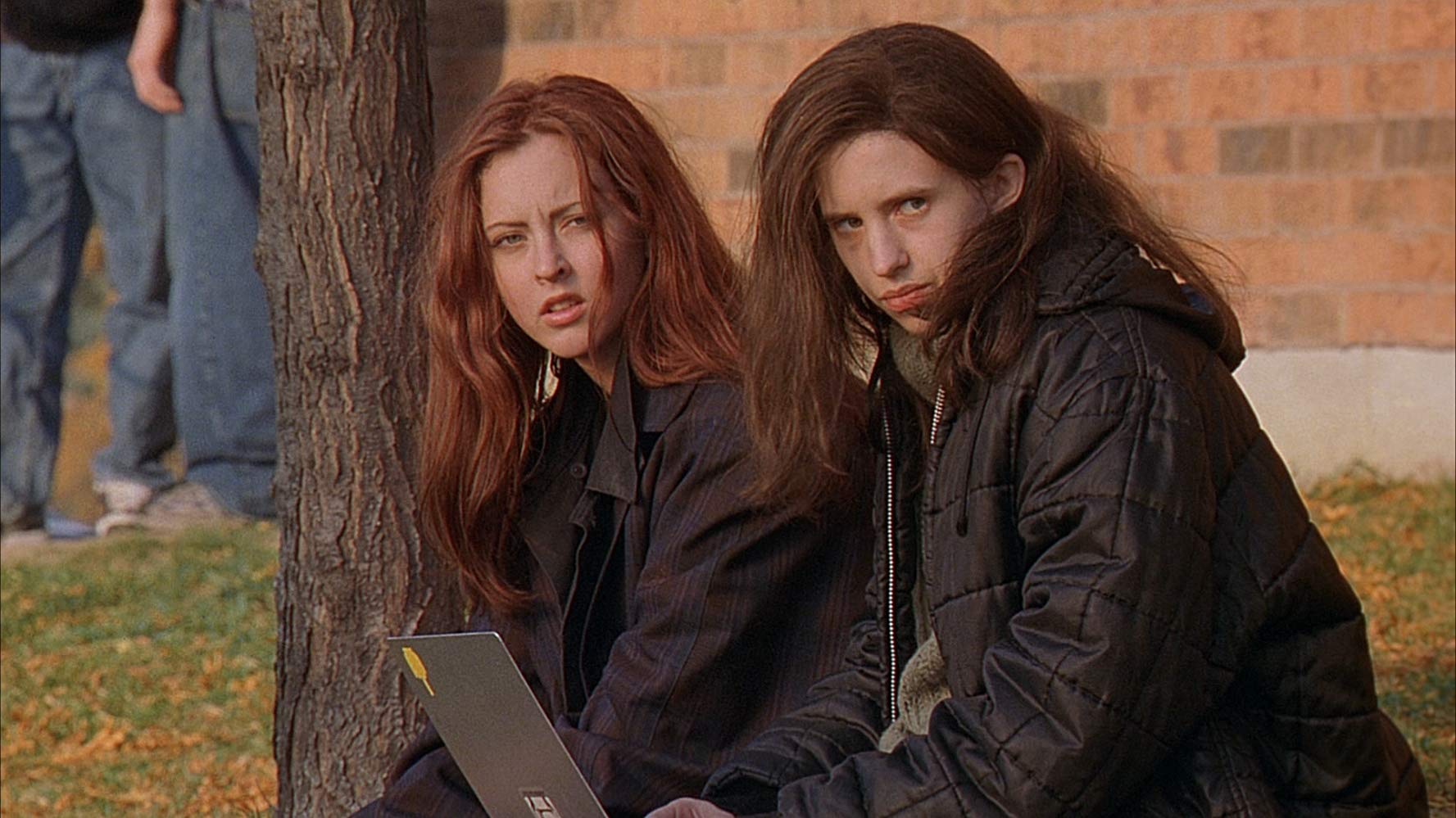 The Fitzgerald sisters - Ginger (Katharine Isabelle) and Bea (Emily Perkins) in Ginger Snaps (2000)