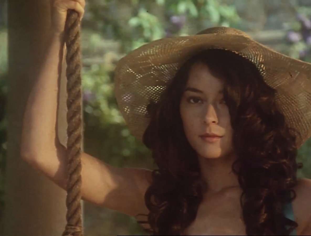 A bewitchingy beautiful and enigmatic Meg Tilly as Karin Forster in The Girl in a Swing (1988)