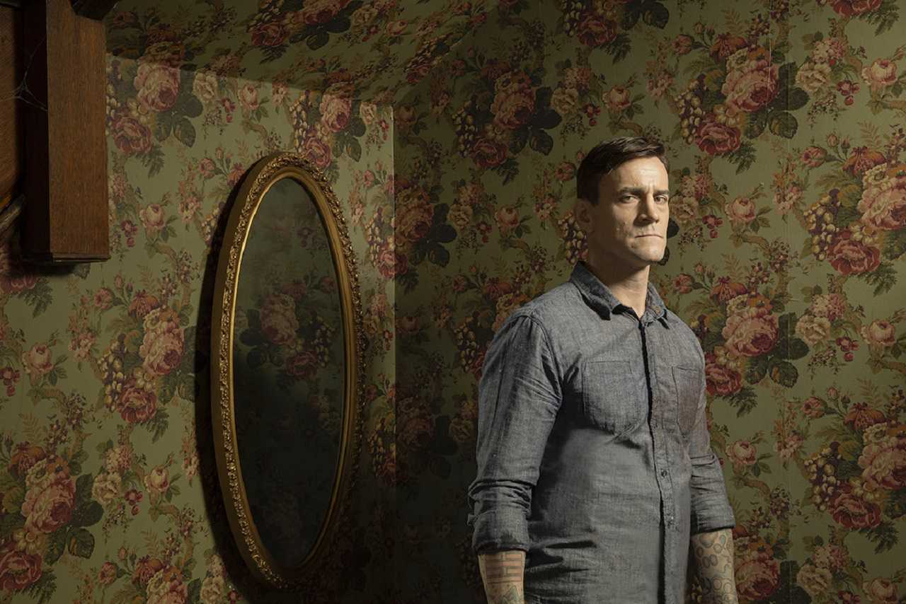 Phil Brooks (aka wrestler C.M. Punk) does some home renovation in Girl on the Third Floor (2019)