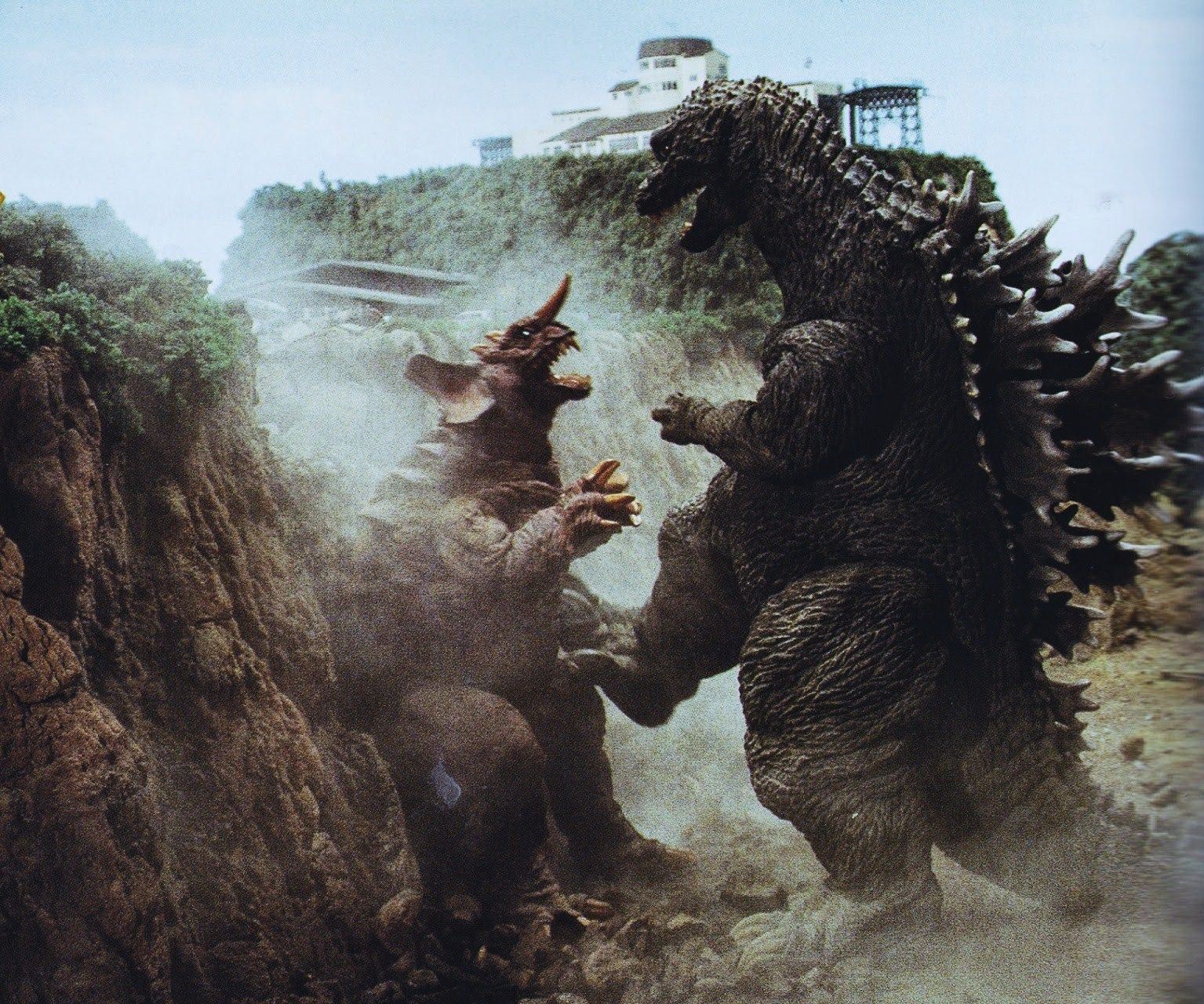 Godzilla beats up Baragon in Godzilla Mothra and King Ghidorah: Giant Monsters All-Out Attack (2001)