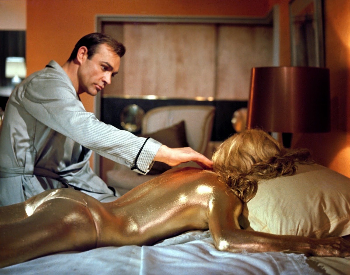 James Bond (Sean Connery) finds Shirley Eaton spray-painted with gold in Goldfinger (1964)