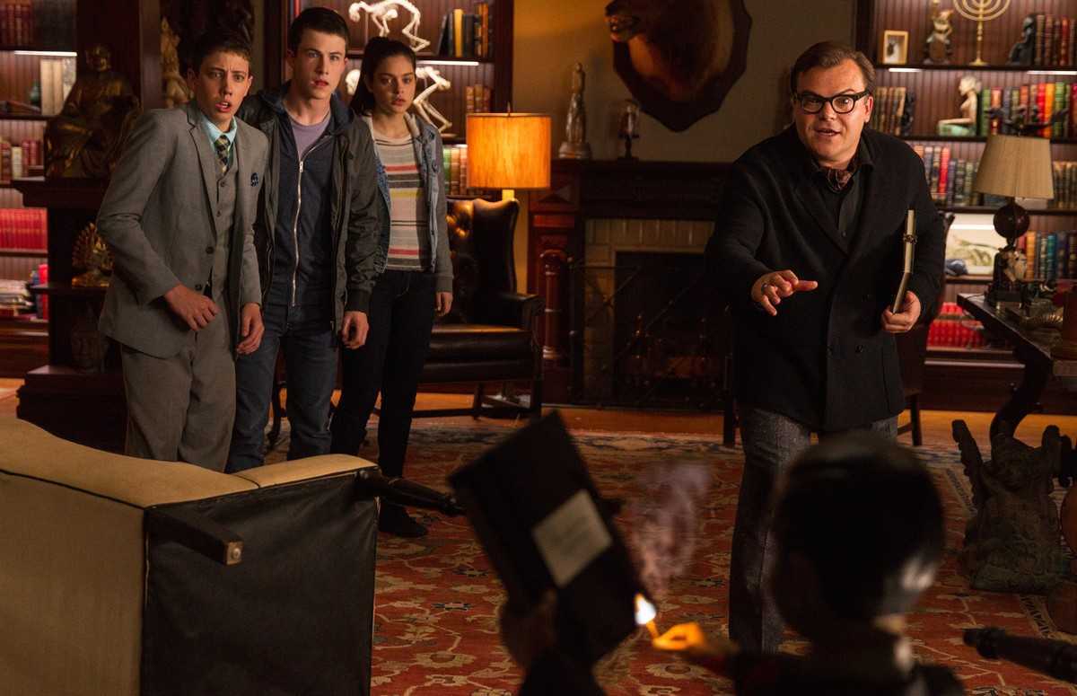 Ryan Lee, Dylan Minette, Odeya Rush and Jack Black face Slappy as he threatens to destroy the books in Goosebumps (2015)