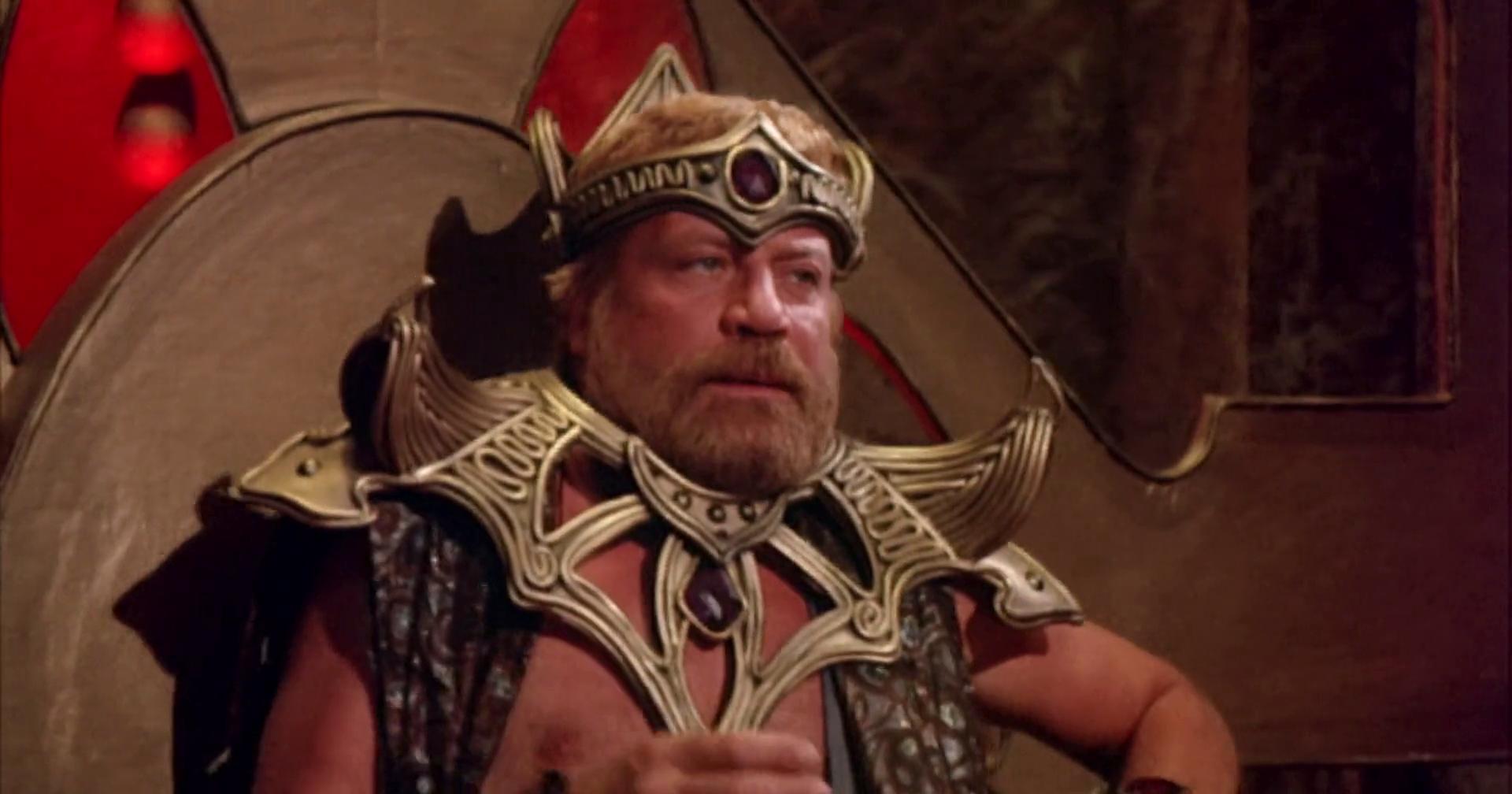 Oliver Reed as the warlord Sarm in Gor (1987)