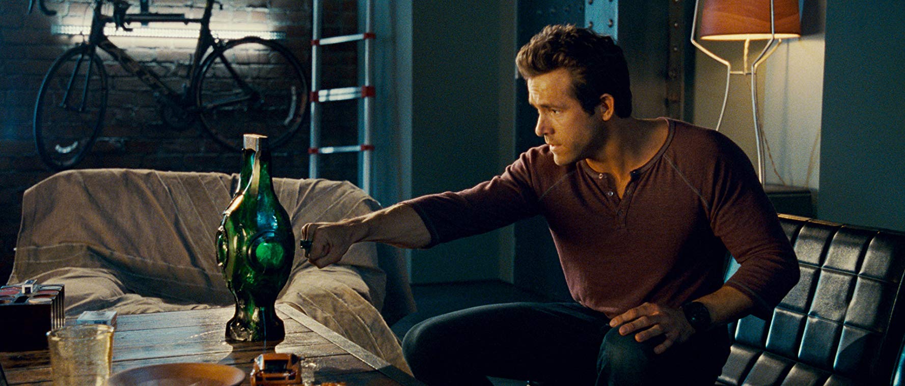 Hal Jordan (Ryan Reynolds) places his ring to the Green Lantern