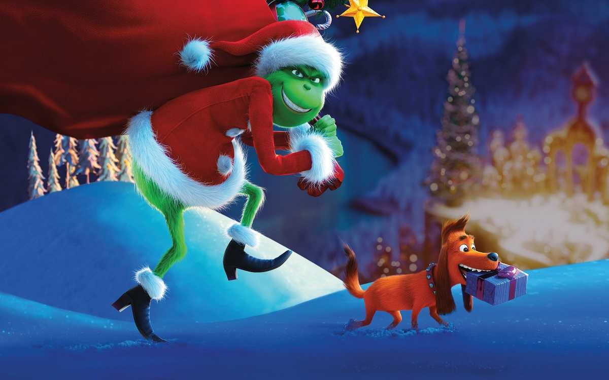 The Grinch accompanied by max steals Christmas from the residents of Whoville in The Grinch (2018)