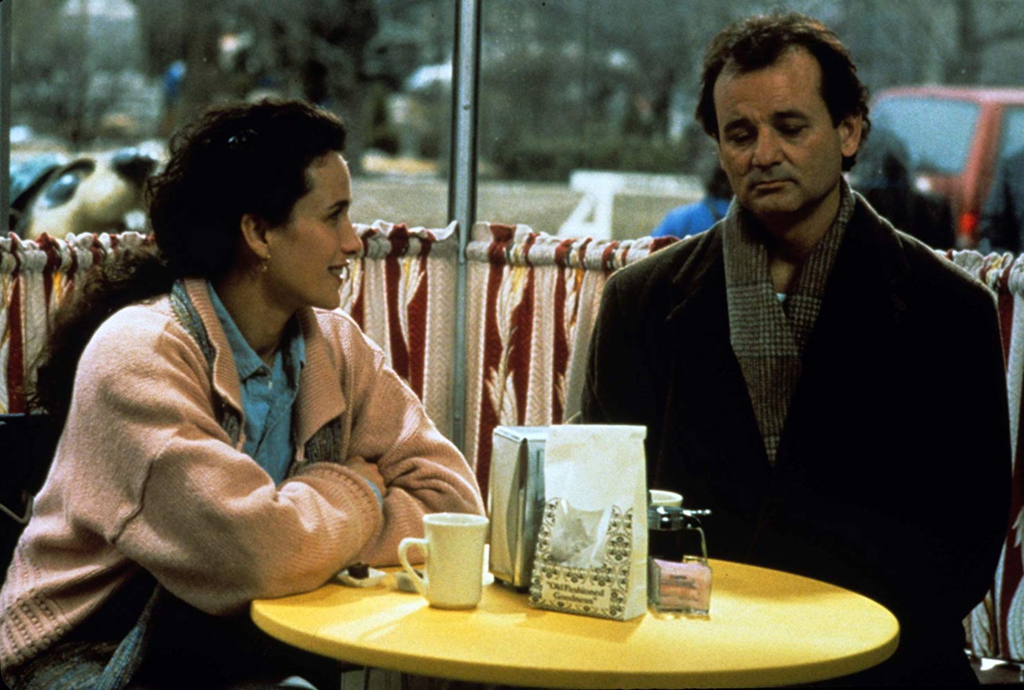 Bill Murray caught in a timeloop and forced to repeat the same day and the object of his affections Andie McDowell in Groundhog Day (1993)