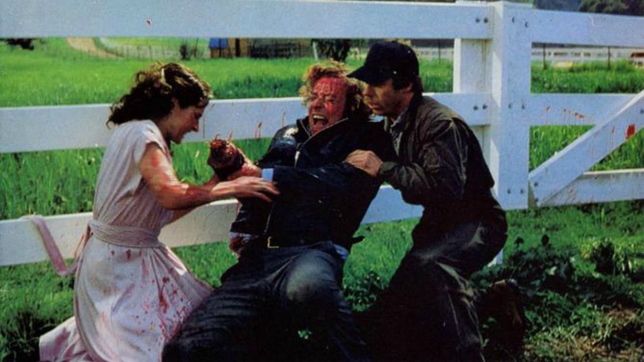 Michael Caine (c) has his hand severed in an accident as Andrea Marcovicci and Bruce McGill try to help in The Hand (1981)