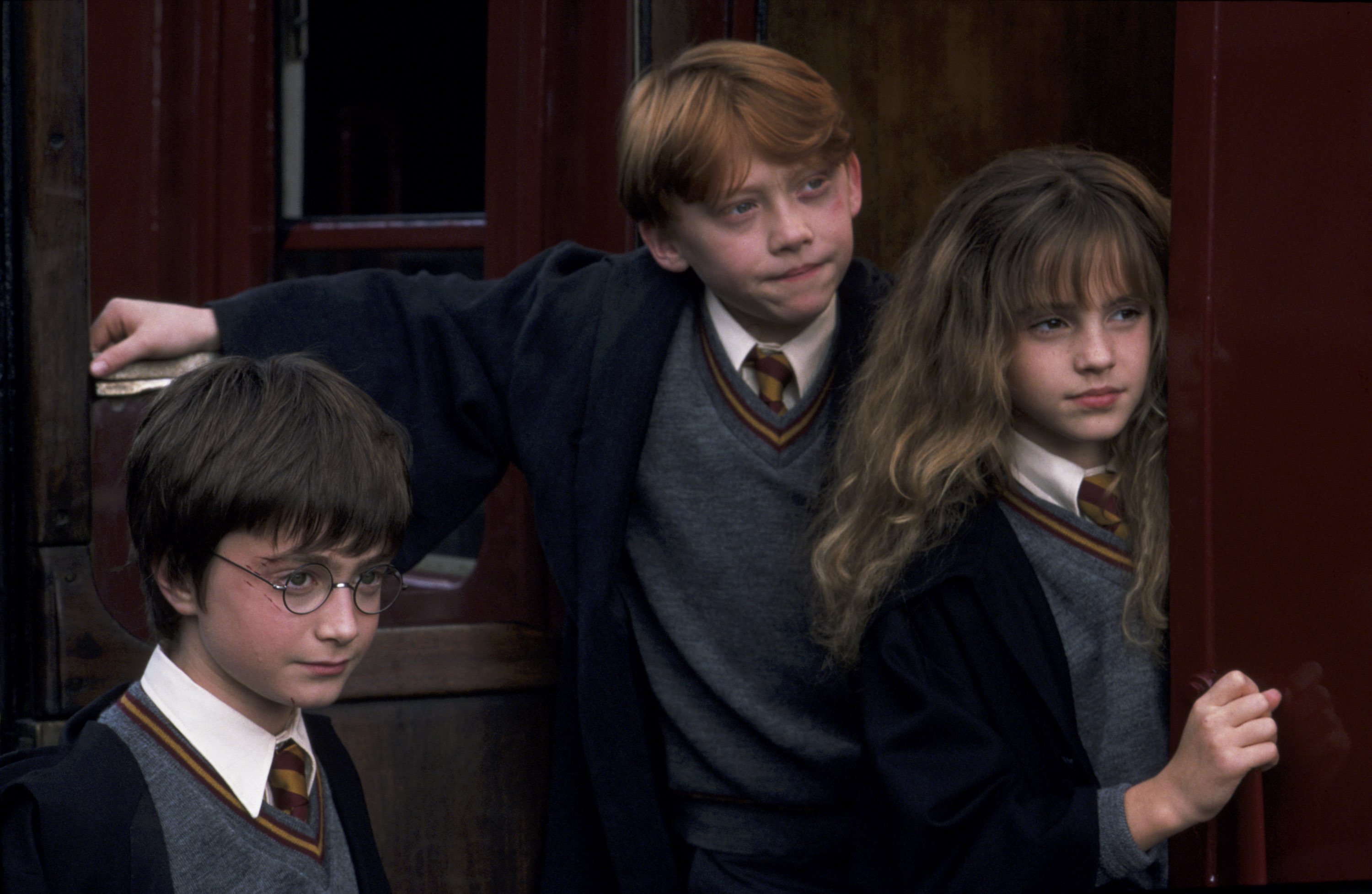 Harry Potter (Daniel Radcliffe), Ron Weasley (Rupert Grint) and Hermione Granger (Emma Watson) in Harry Potter and the Sorcerer's Stone (2001)