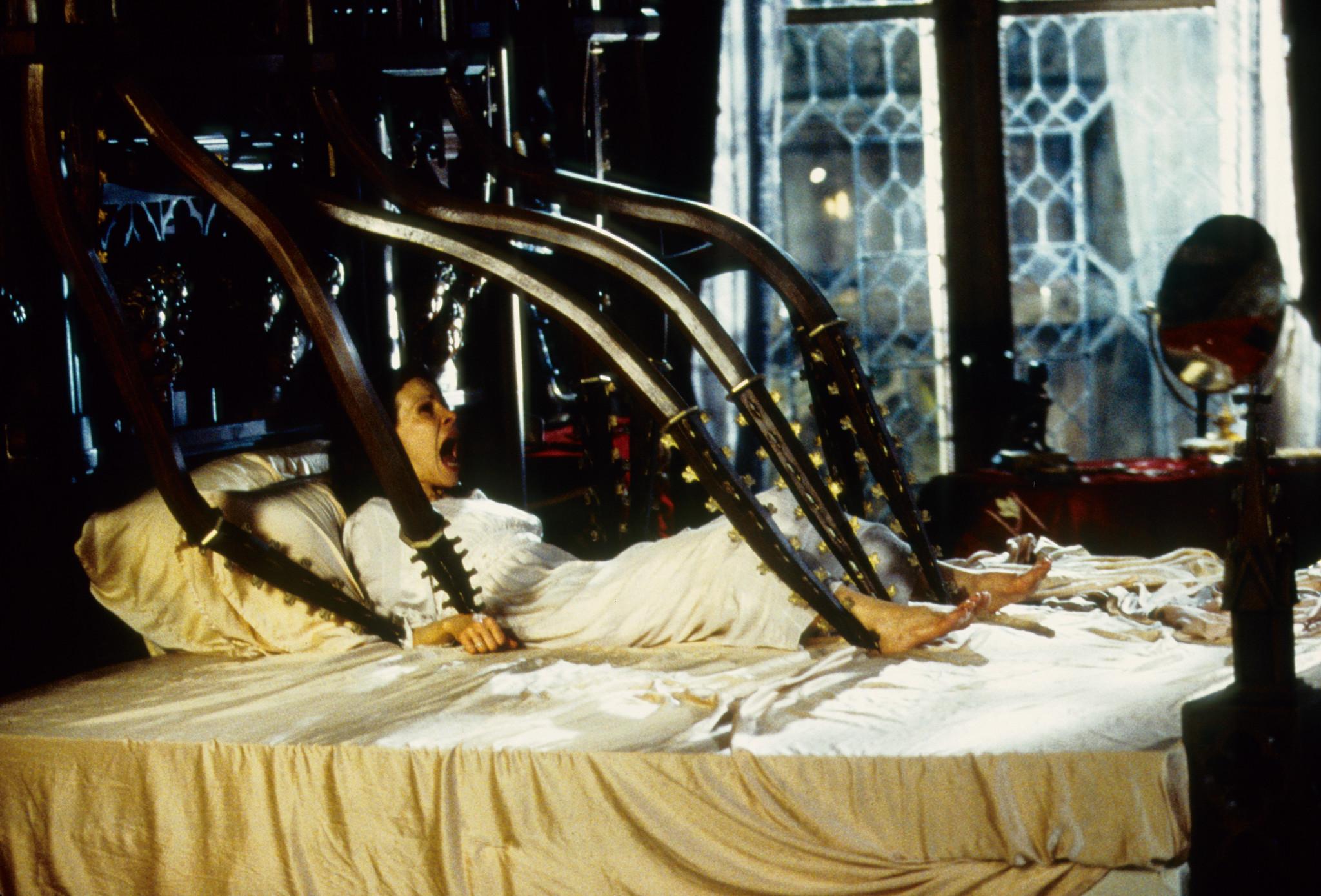 Lili Taylor attacked by a wrought iron bed in The Haunting (1999)