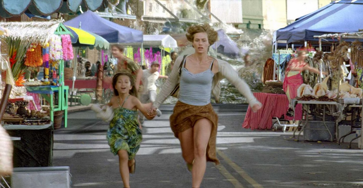 Cecile de France and a local girl flee from a tsunami in Hereafter (2010)