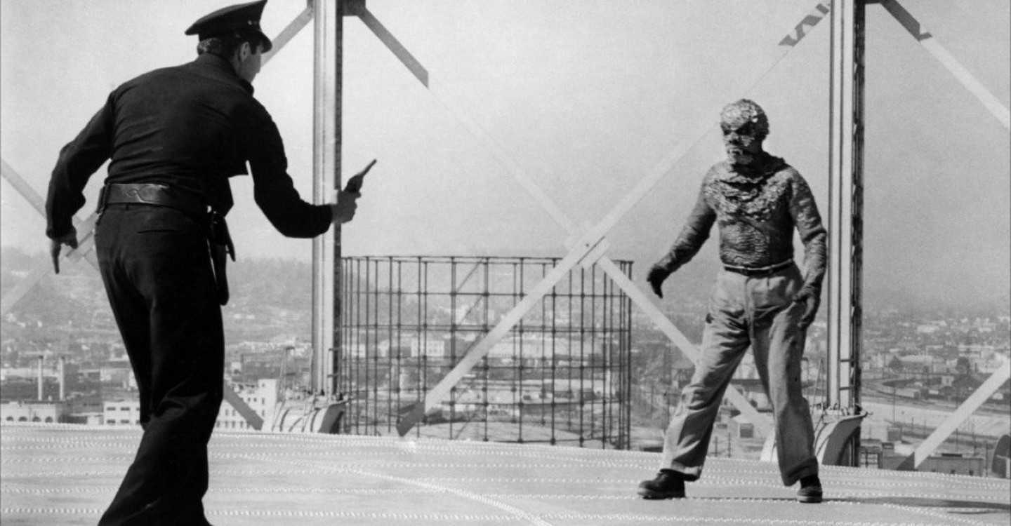 Robert Clarke is cornered on a rooftop in The Hideous Sun Demon (1959)