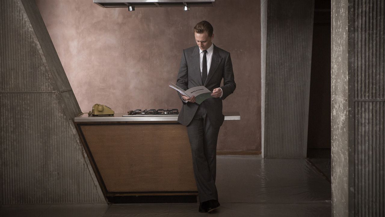Tom Hiddleston amid the film's brutalist retro design scheme in High-Rise (2015)