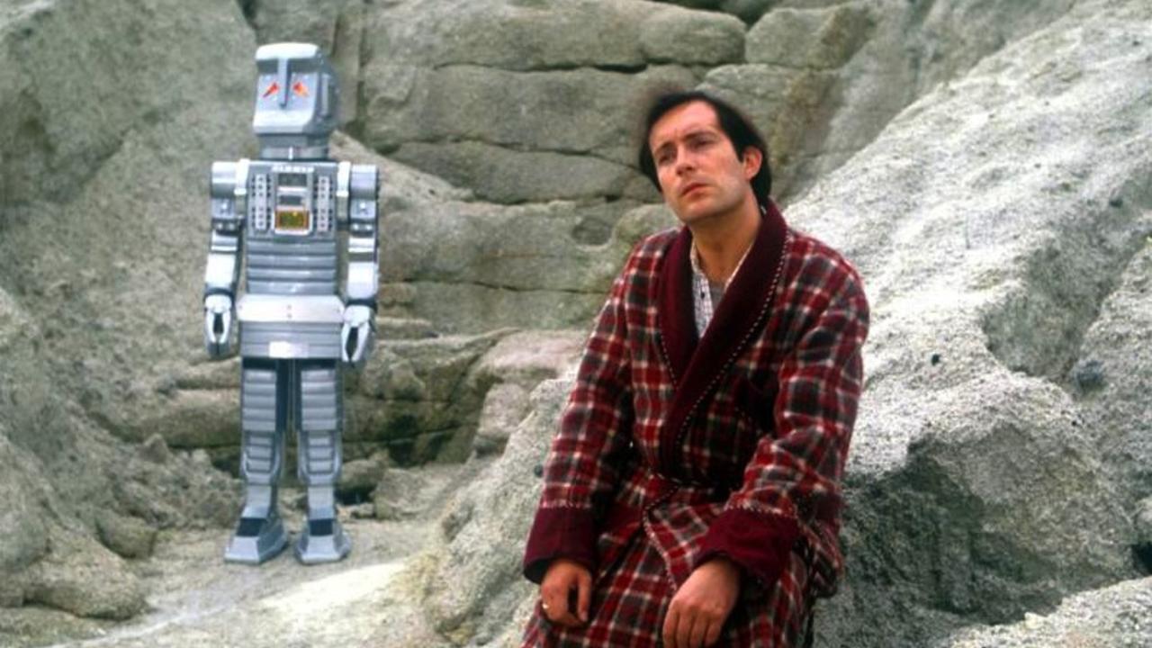 Arthur Dent (Simon Jones) and Marvin the Paranoid Android in The Hitch Hikers Guide to the Galaxy (1981)