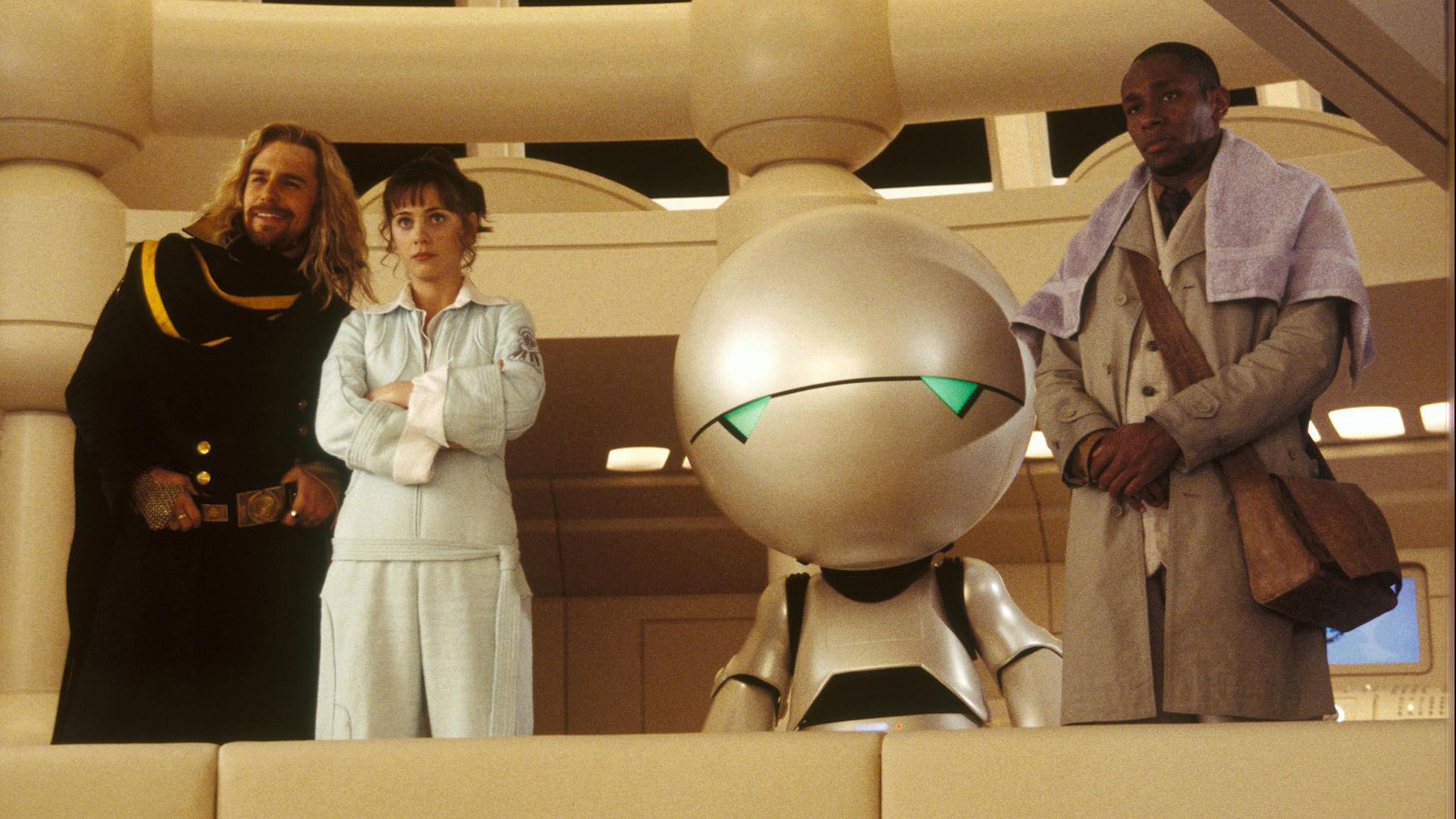 Zaphod Beeblebrox (Sam Rockwell), Trillian (Zooey Deschanel). Marvin the Paranoid Android and Ford Prefect (Mos Def) in The Hitch Hiker's Guide to the Galaxy (2005)