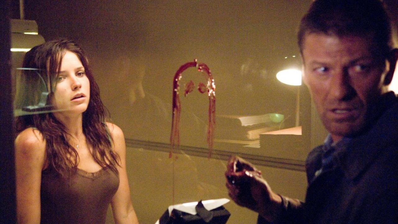 Sophia Bush in an interrogation room as Sean Bean invades the police station in The Hitcher (2007)