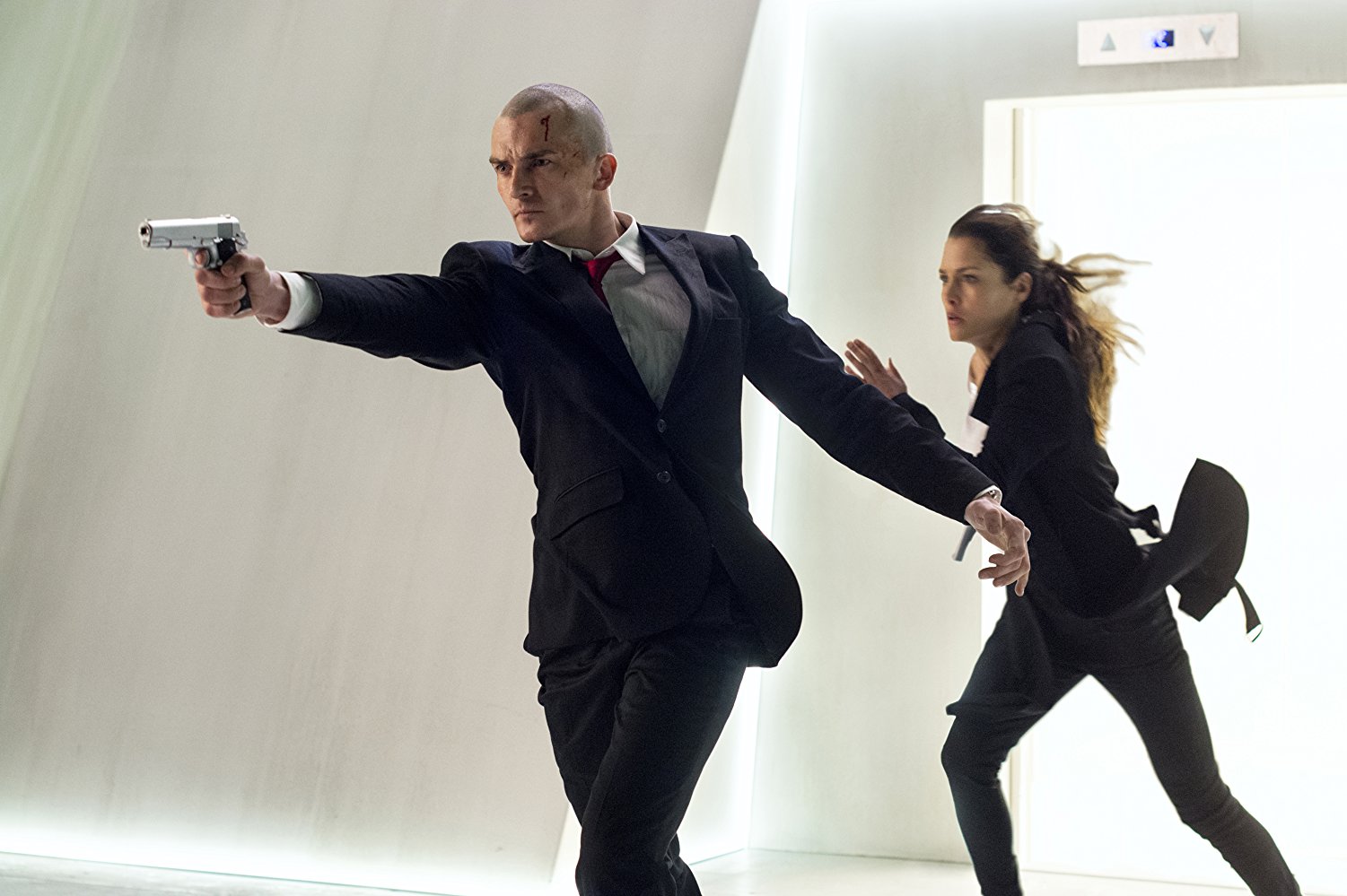 Rupert Friend, Hannah Ware in Hitman: Agent 47 (2015)