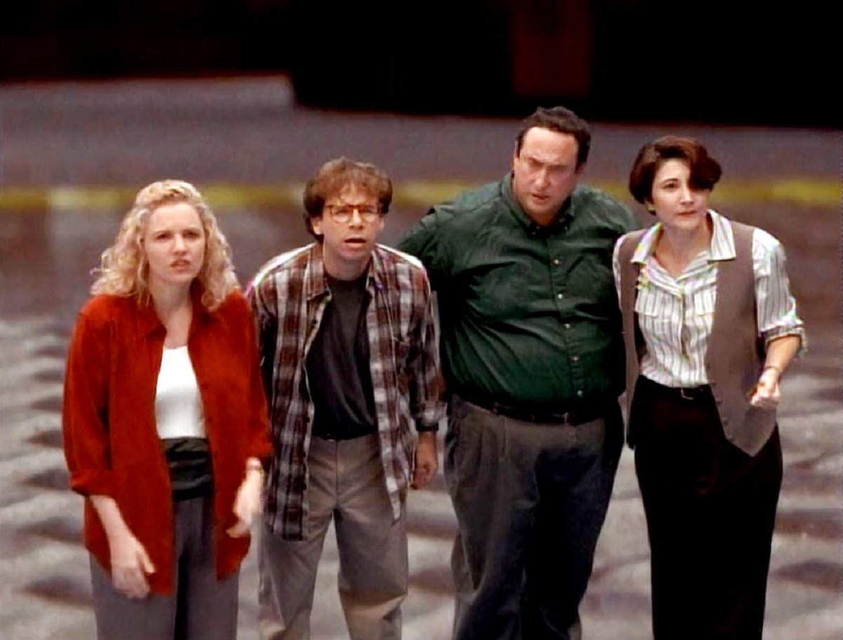 Diane (Eve Gordon), Wayne Szalinski (Rick Moranis), brother Gordon (Stuart Pankin) and wife Patty (Robin Bartlett) get shrunk in Honey, We Shrunk Ourselves (1997)