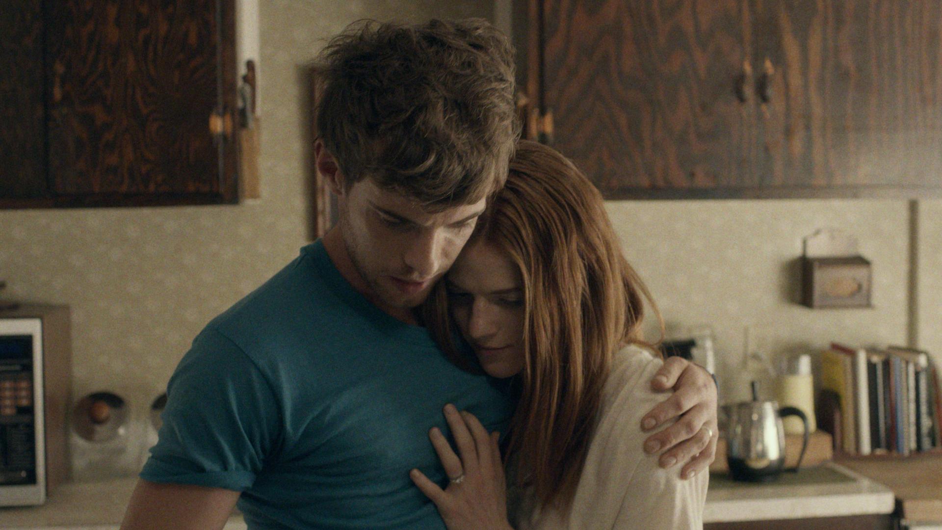 Newlyweds Harry Treadaway and Rose Leslie in a tender moment in Honeymoon (2014)