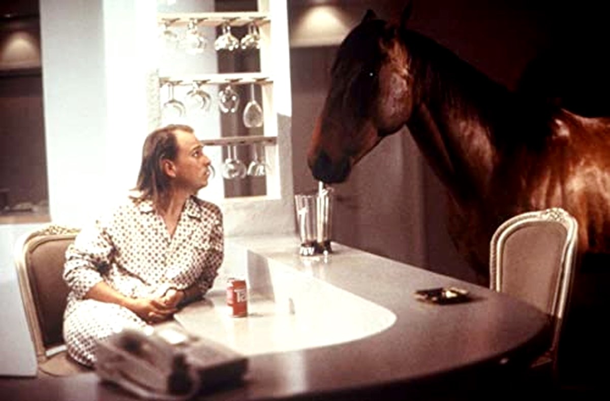 Bobcat Goldthwait and Don the horse in Hot to Trot (1988)