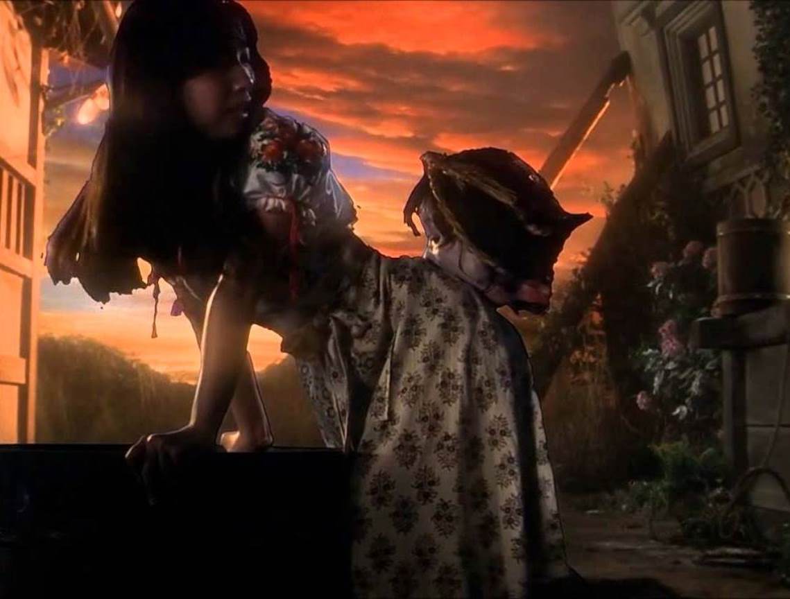 Kimiko Ikegami bitten on the butt by a flying head in House (1977)