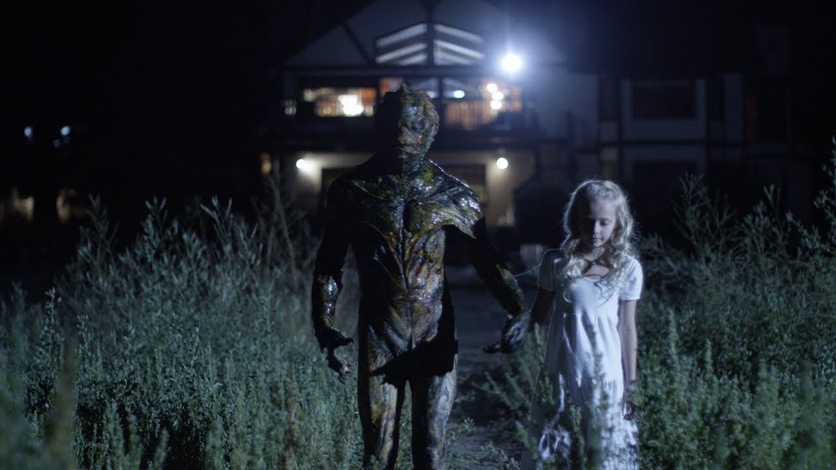 Young Emma (Amiah Miller) and the Fish Man in House By the Lake (2017)