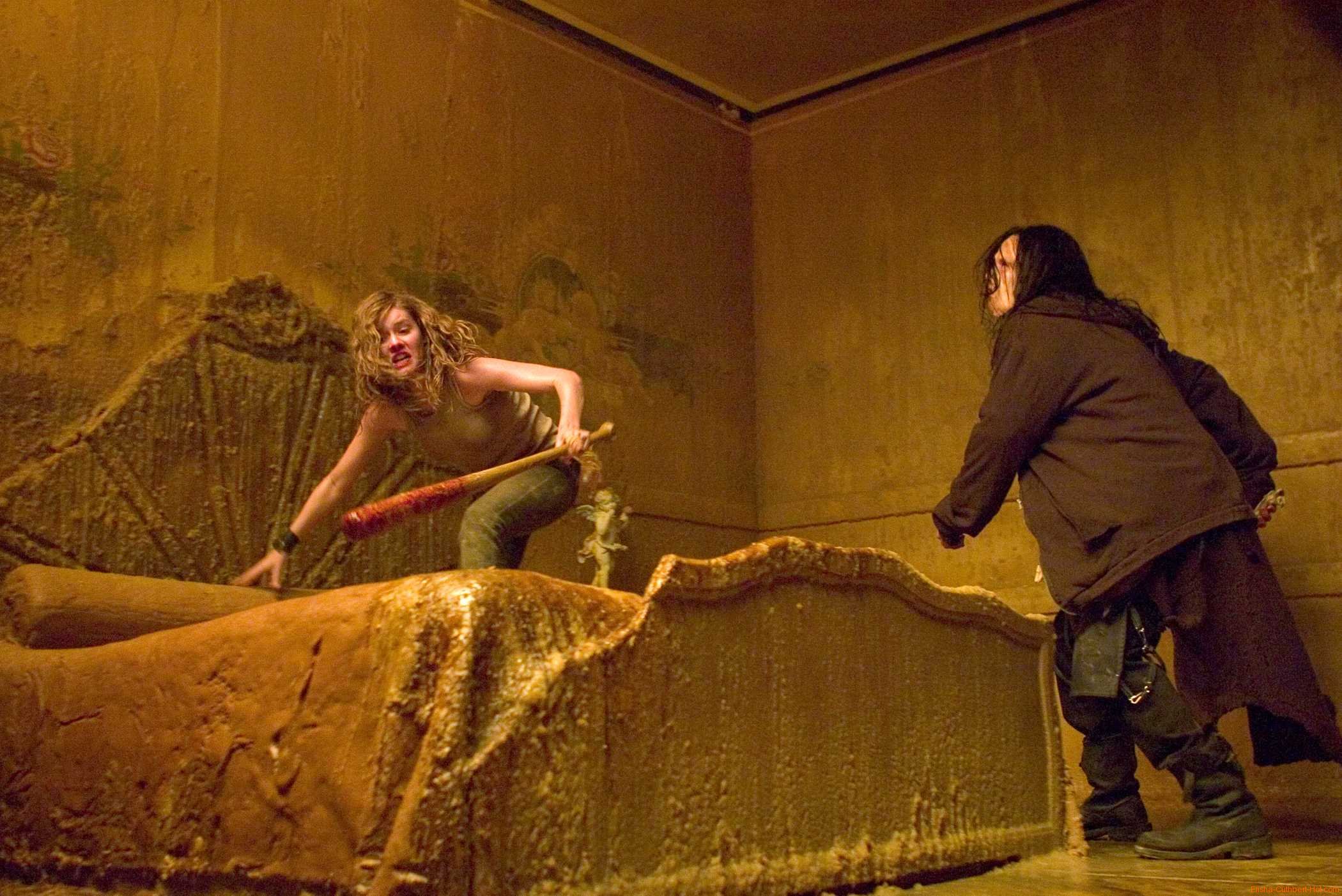 Elisha Cuthbert pursued by Brian Van Holt through the House of Wax (2005)