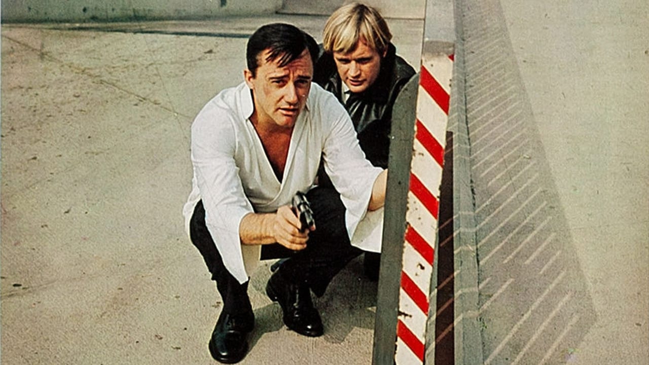 U.N.C.L.E. agents Napoleon Solo (Robert Vaughn) and Ilya Kuryakin (David McCallum) in How to Steal the World (1968)