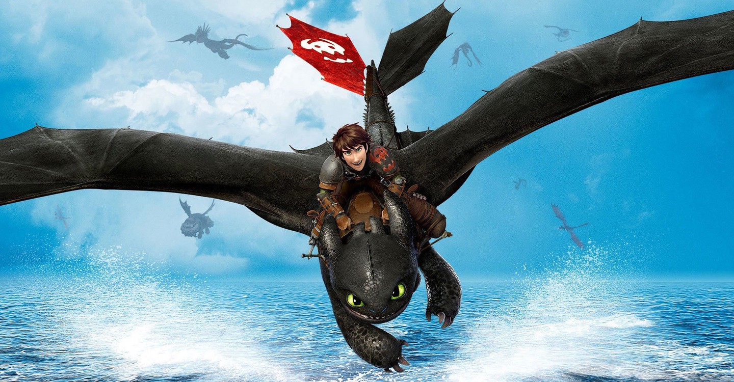 Hiccup (voiced by Jay Baruchel) and Toothless the dragon in flight in How to Train Your Dragon 2 (2014)