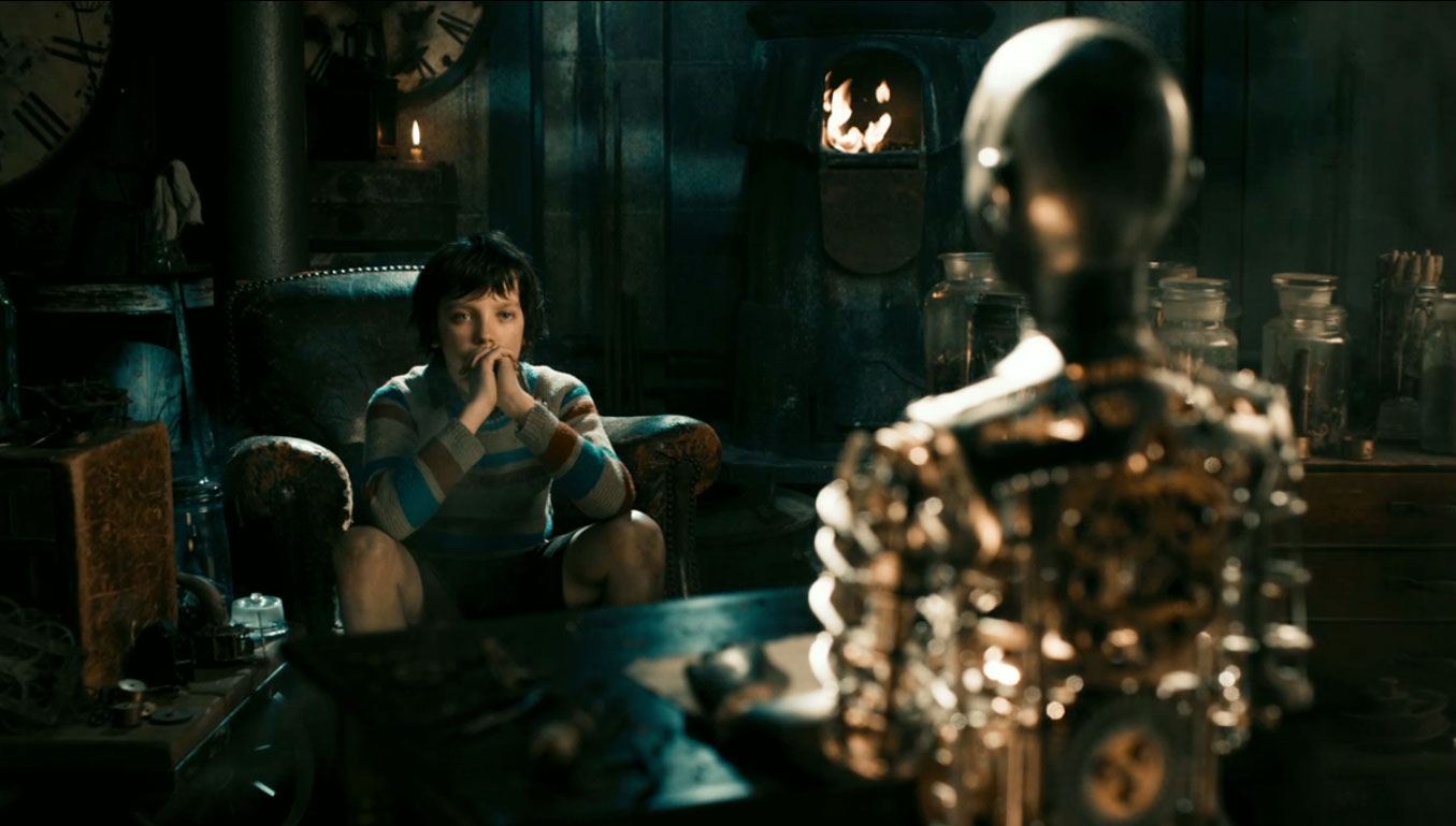 Asa Butterfield contemplates the automata in Hugo (2011)