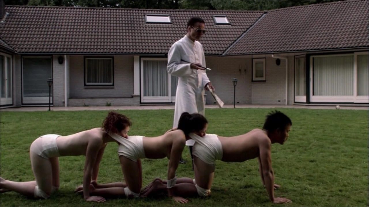 Dieter Laser, Ashlynn Yennie, Ashley C. Williams and Akihiro Kitamura in The Human Centipede (First Sequence) (2009)