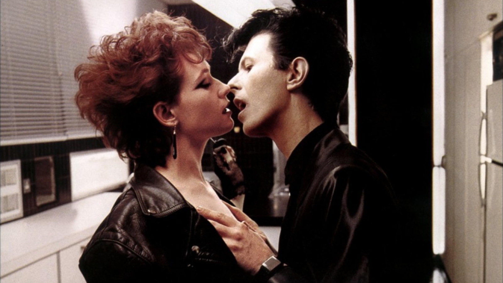 David Bowie preys upon Ann Magnuson in The Hunger (1983)