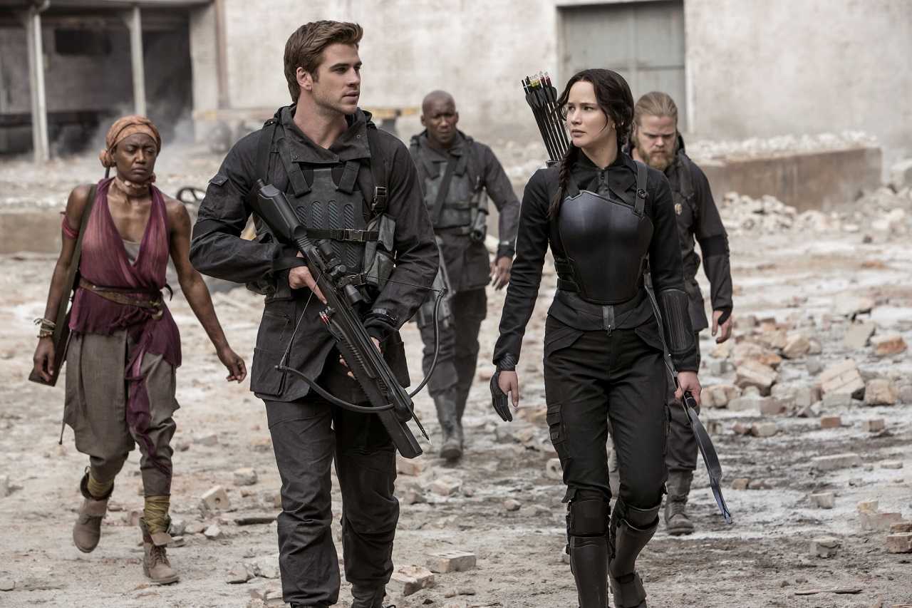 Liam Hemsworth, Jennifer Lawrence, Patina Miller, Mahershala Ali and Eldon Henson in The Hunger Games: Mockingjay Part 1 (2014)