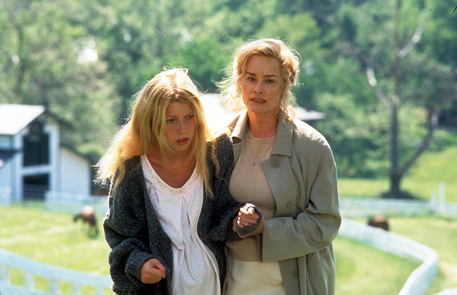A pregnant Gwyneth Paltrow is escorted away by evil mother-in-law Jessica Lange in Hush (1998)