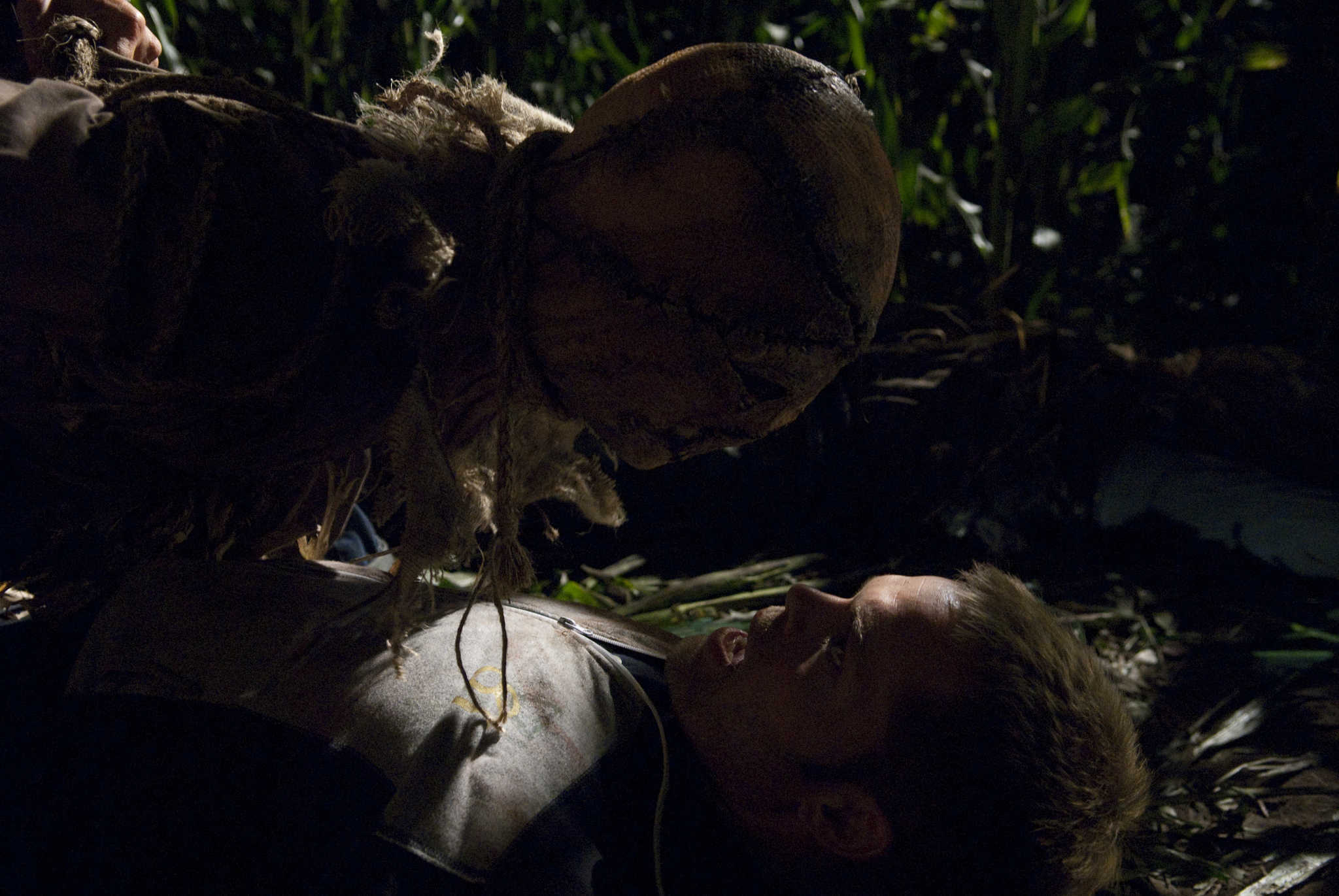 Wes Chatham attacked by a scarecrow in Husk (2011)