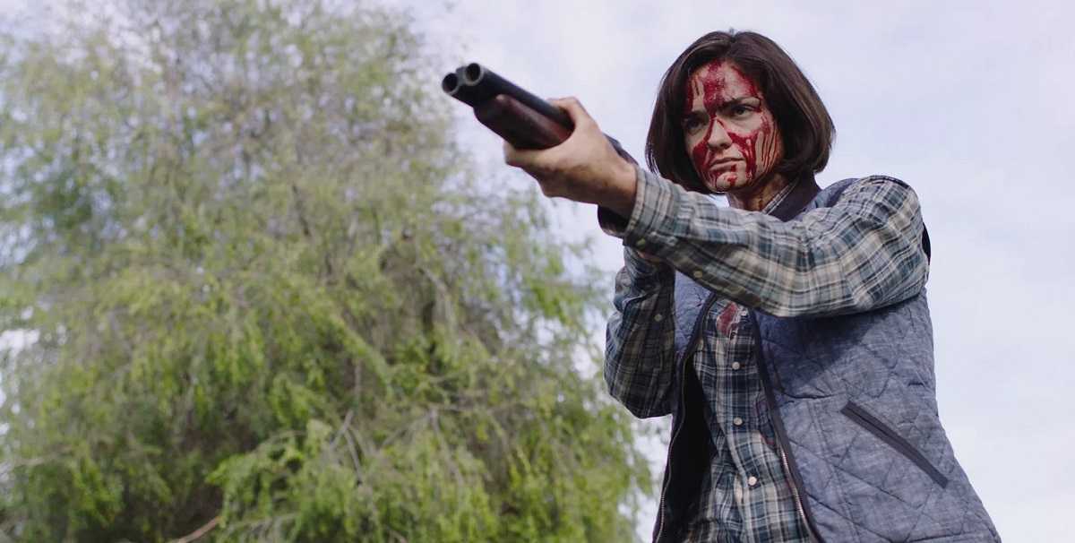 Jamie Bernadette as Jennifer Hill's daughter on the revenge trail after being subject to the same assault as her mother in I Spit on Your Grave: Deja Vu (2019)