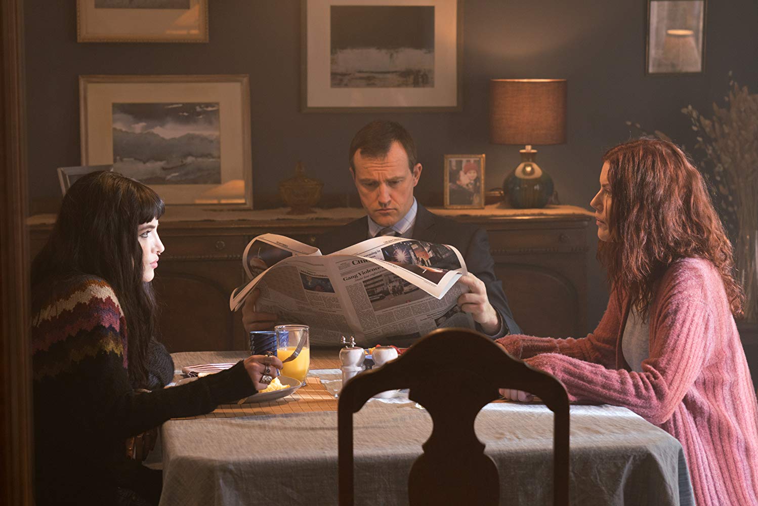 Bella Thorne (l) and mother Amy Price-Frances (r) eat breakfast along with the remnant of her father (Shaun Benson) (c) in I Still See You (2018)