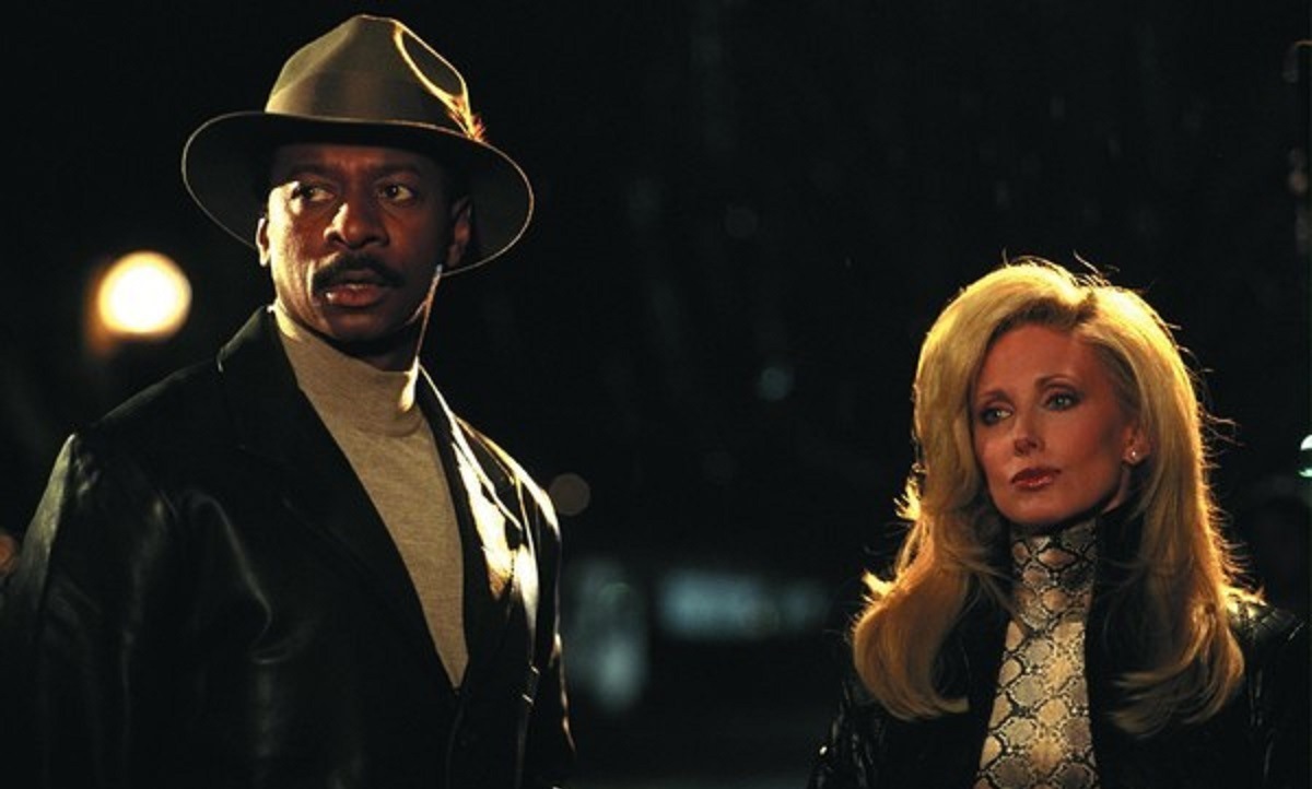 Mr Five (Robert Townsend) and Babylonia Fine (Morgan Fairchild) in I Was a Teenage Faust (2001)